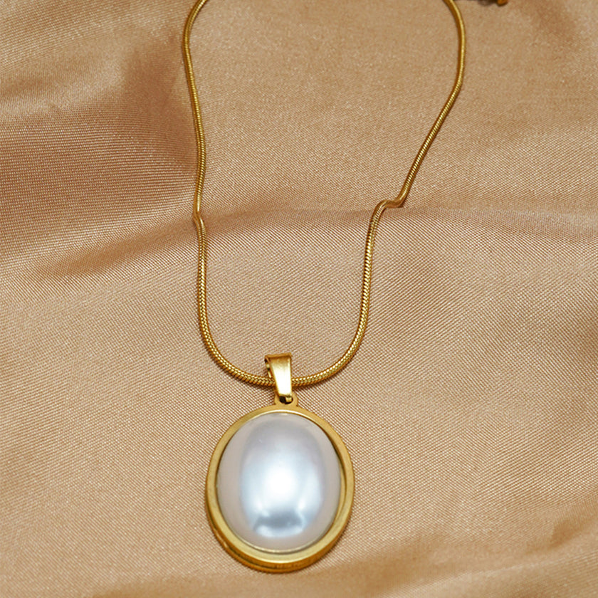 Lxalry Golden Jewelry Set - Elegant Necklace & Ring Combo With Oval Design, Metal Polished Finish, Perfect For Both Day & Night Occasions