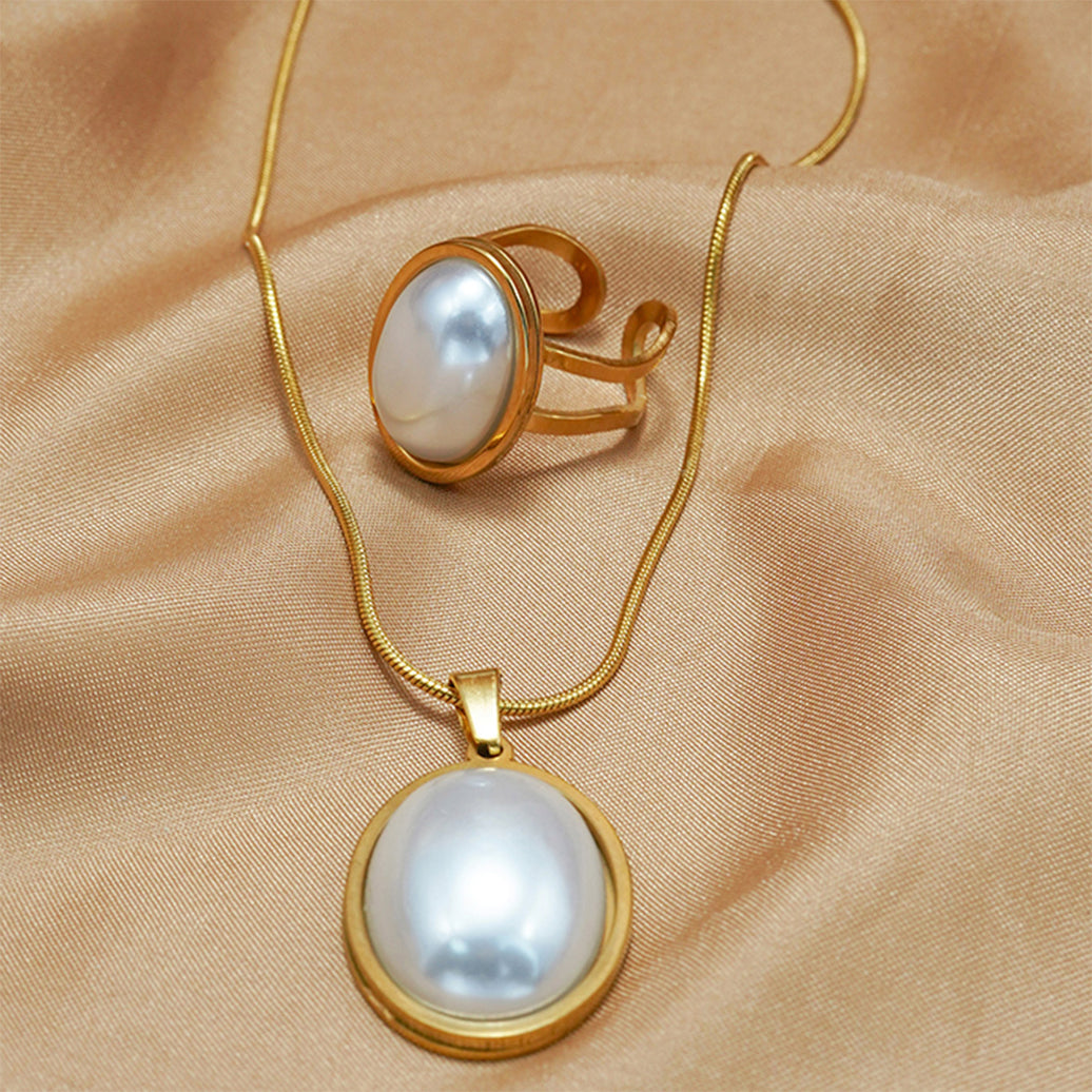 Lxalry Golden Jewelry Set - Elegant Necklace & Ring Combo With Oval Design, Metal Polished Finish, Perfect For Day & Night Occasions