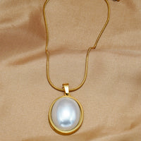 Lxalry Golden Jewelry Set - Elegant Necklace & Ring Combo With Oval Design, Metal Polished Finish, Perfect For Day & Night Occasions